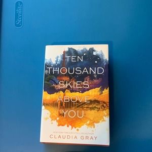 Ten Thousand‎ Skies Above You Book Hardcover
